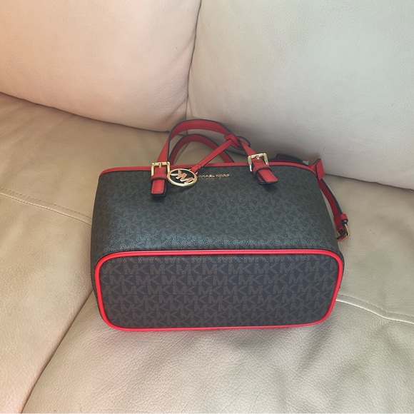 This is the Michael Kors Jet Set Travel Extra-Small Logo Top-Zip Tote Bag. - Picture 2 of 4